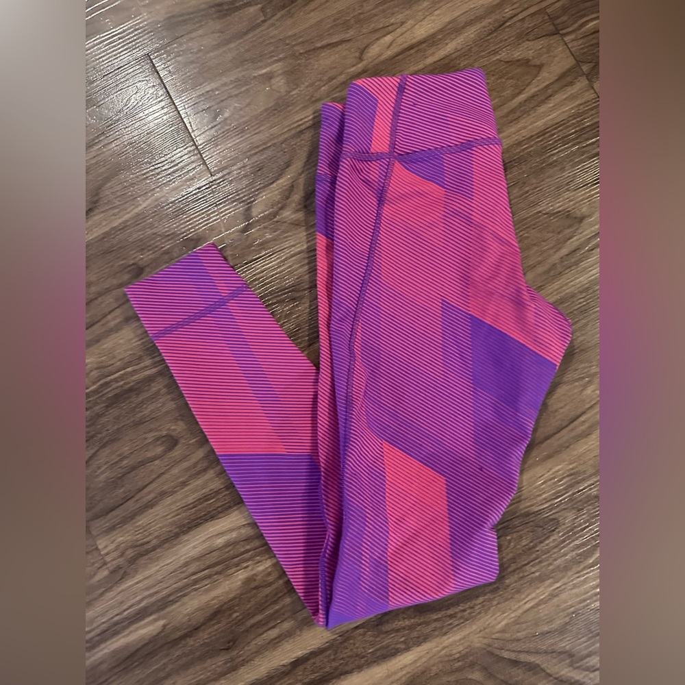 Reebok Pink With Purple Leggings For Women Size S gently used